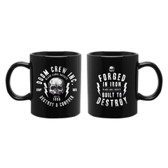 Two black coffee mugs with skull designs from Doom Crew Inc. Destroy & Conquer collection