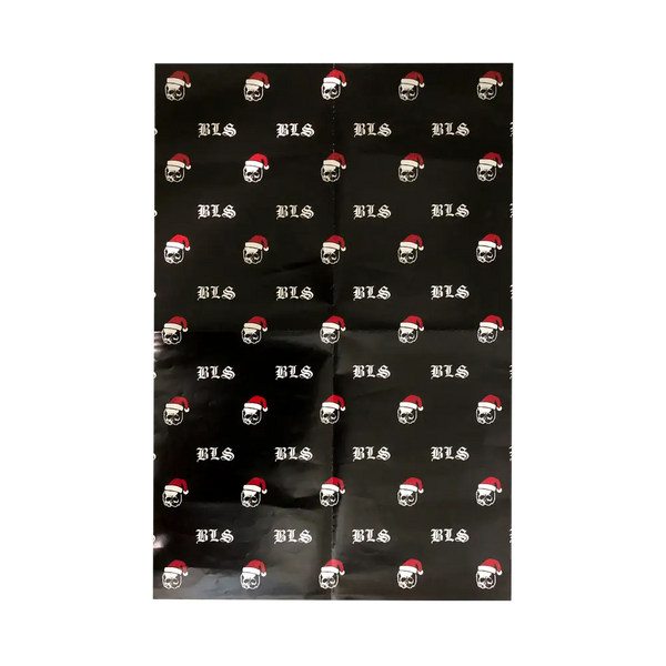 Repeating pattern of skulls in Santa hats on Skully Santa Wrapping Paper background