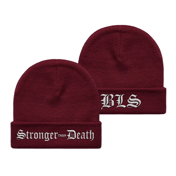 Two burgundy knit Stronger Than Death maroon beanies with white embroidery