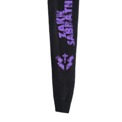 Black sleeve of Zakk Sabbath Void Of Reality Long Sleeve Tee with purple text and cross design